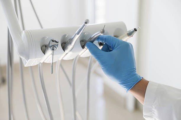 Professional Tooth Extraction technician working in The Village, OK
